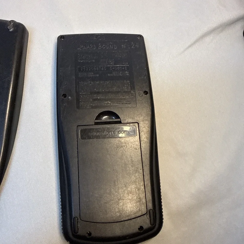Texas Instruments TI-83 Handheld Graphing Calculator